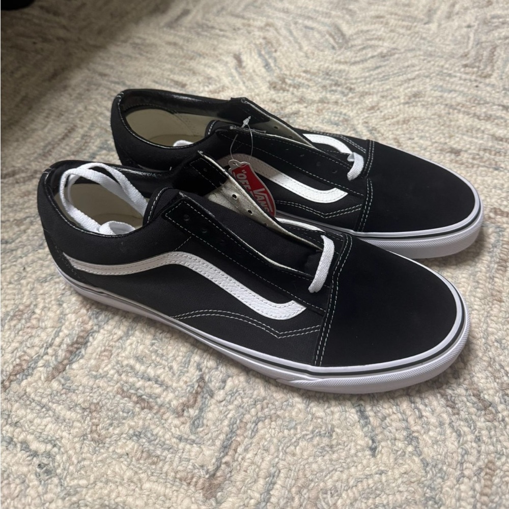 Vans Men's Black and White Slip-On Sneakers